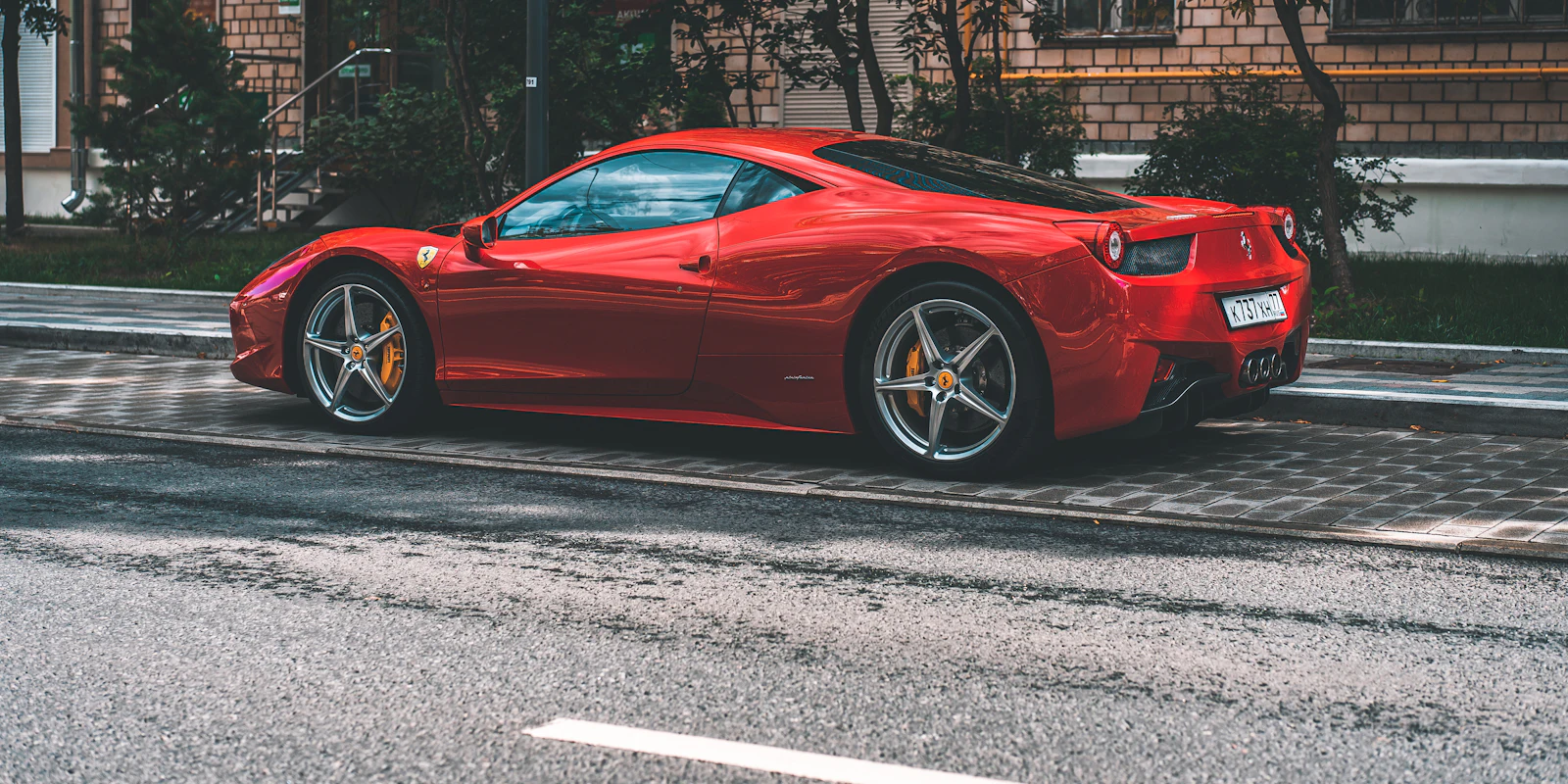 Red Ferrari 458 Italia on the road